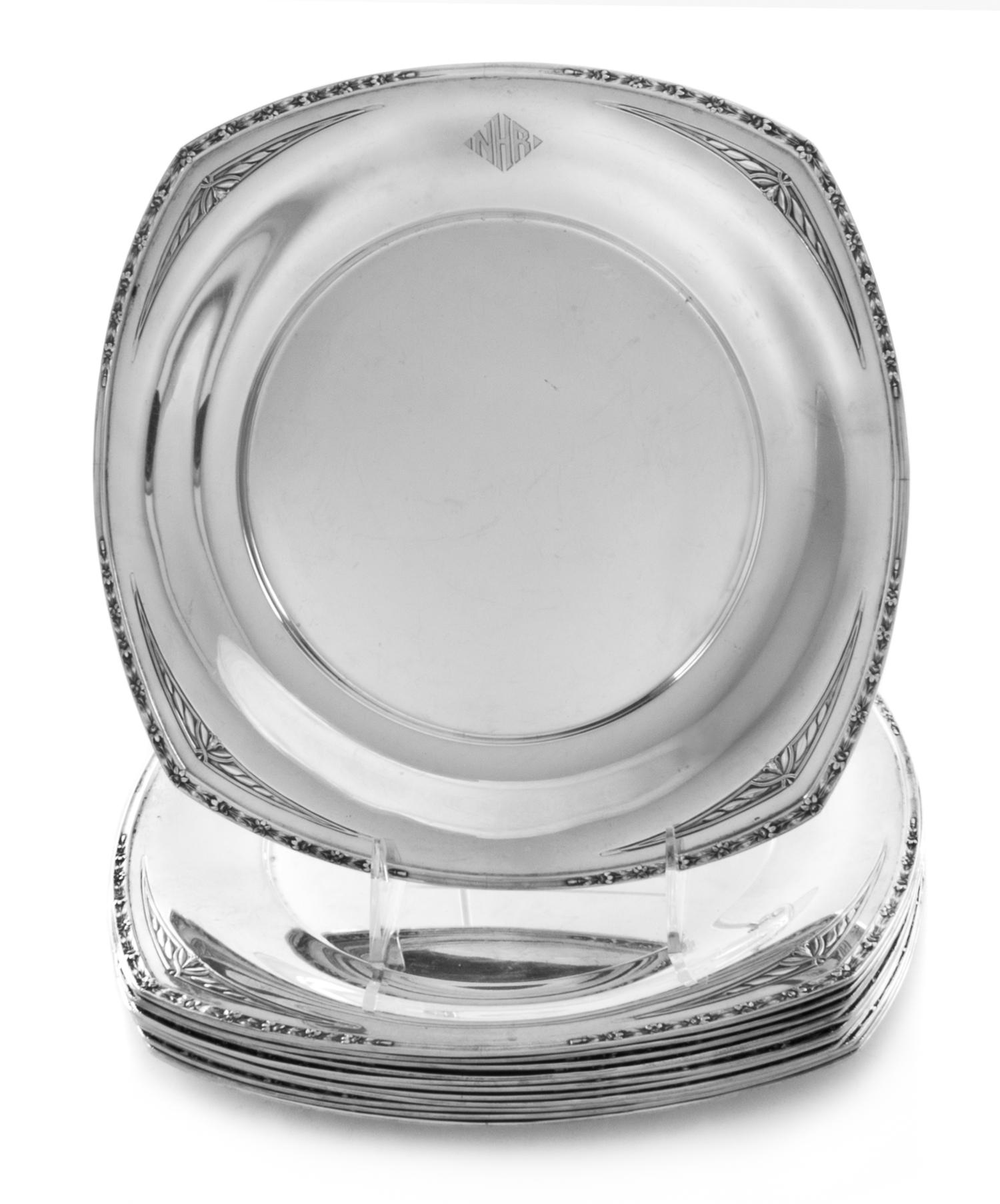 Twelve American Silver Dinner Plates, R. Wallace and Sons, Wallingford, CT, of square form with rounded sides, the rims worked to show