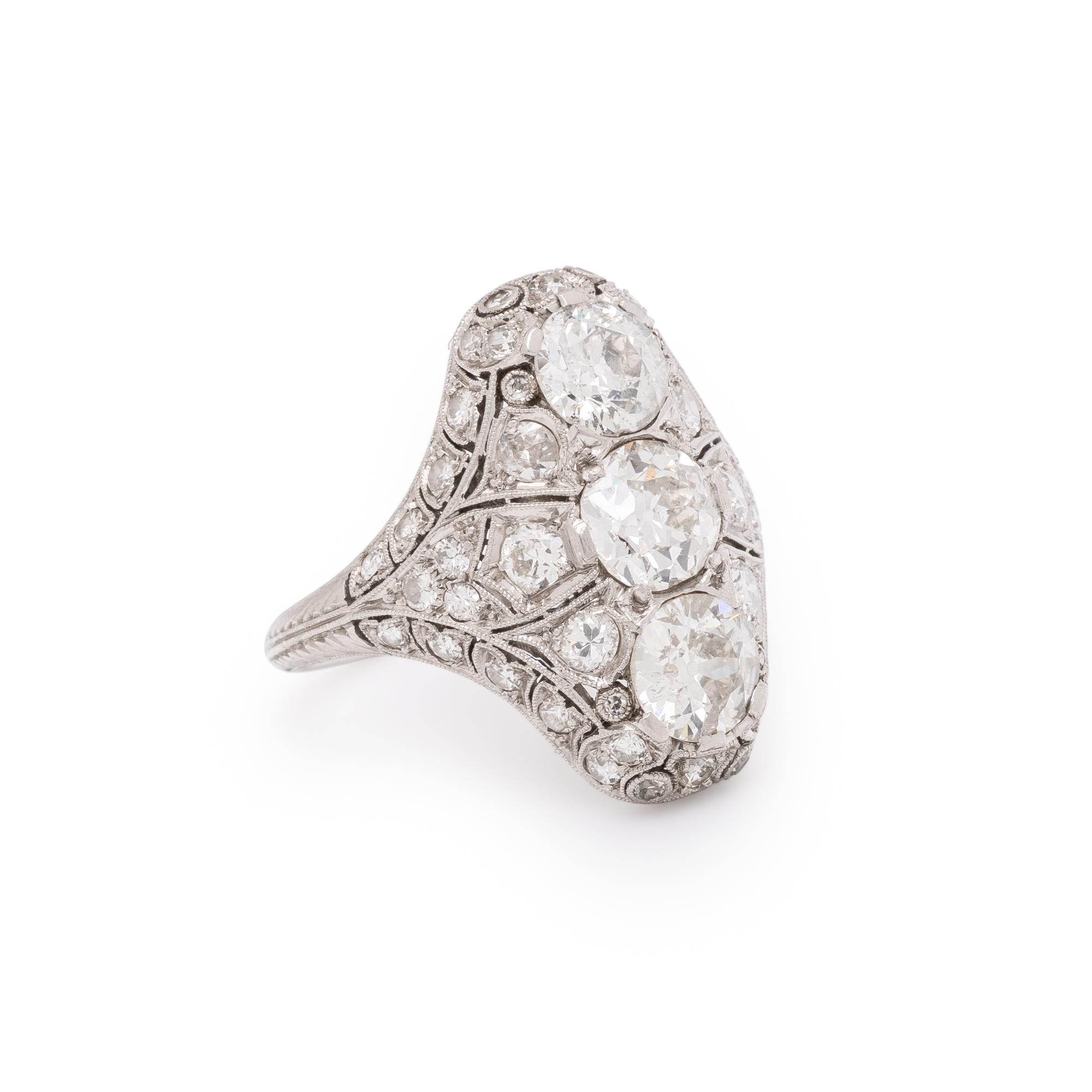 ANTIQUE, DIAMOND AND PLATINUM NAVETTE RING