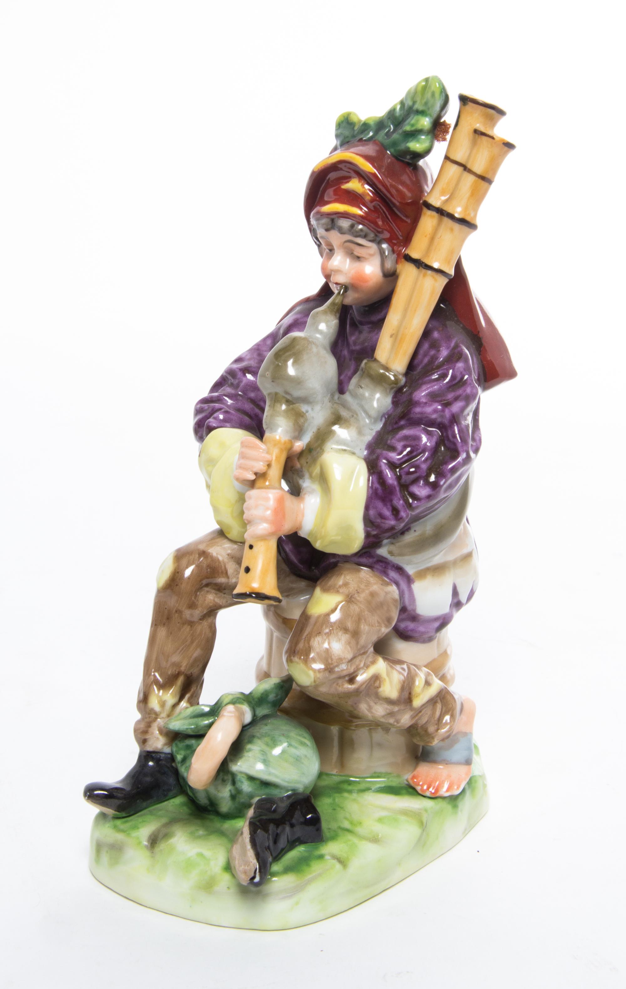 A Continental Porcelain Figure Height 7 1/8 inches. — 20TH CENTURY
