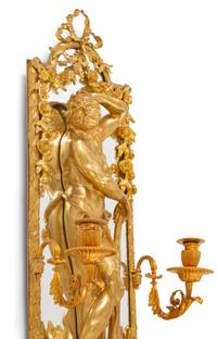 A Pair of Large Louis XVI Style Mirrored Gilt Bronze Figural Sconces