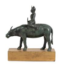 An Indian or Southeast Asian Bronze Model of a Figure on a Water Buffalo