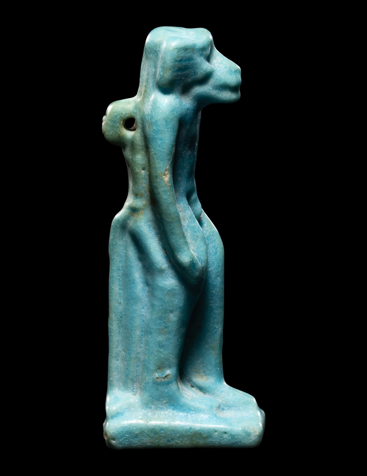 An Egyptian Faience Monkey