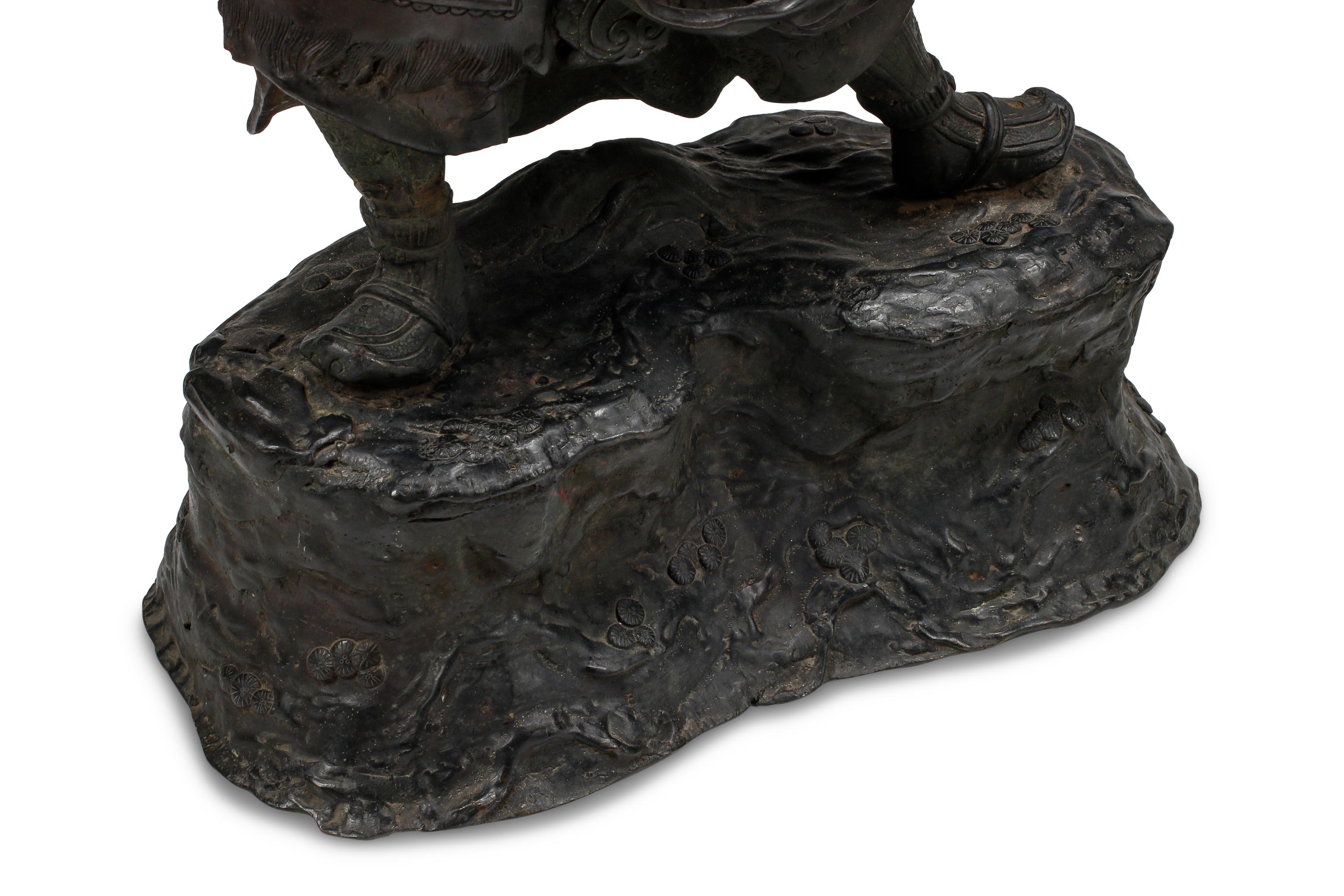 A Pair of Chinese Bronze Figures