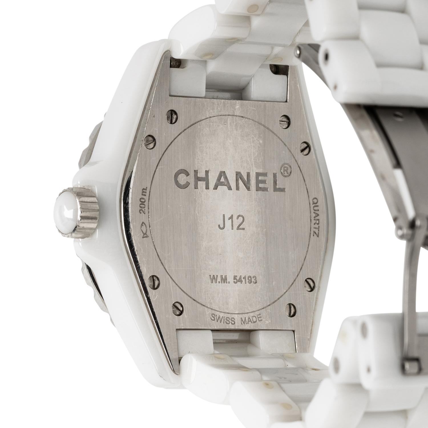 CHANEL, 'J12' CERAMIC AND DIAMOND DATE WATCH, BOX, PAPERS, AND EXTRA LINKS