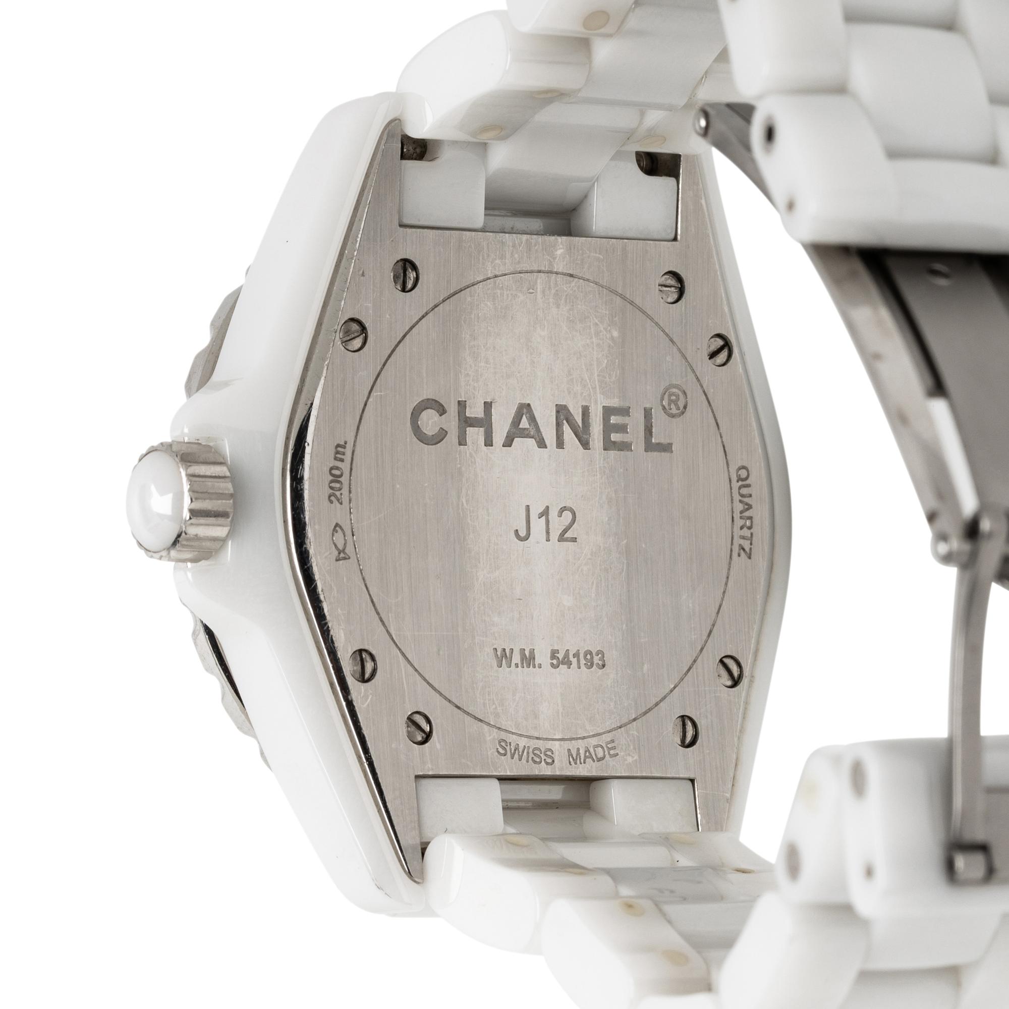 CHANEL, 'J12' CERAMIC AND DIAMOND DATE WATCH, BOX, PAPERS, AND EXTRA LINKS
