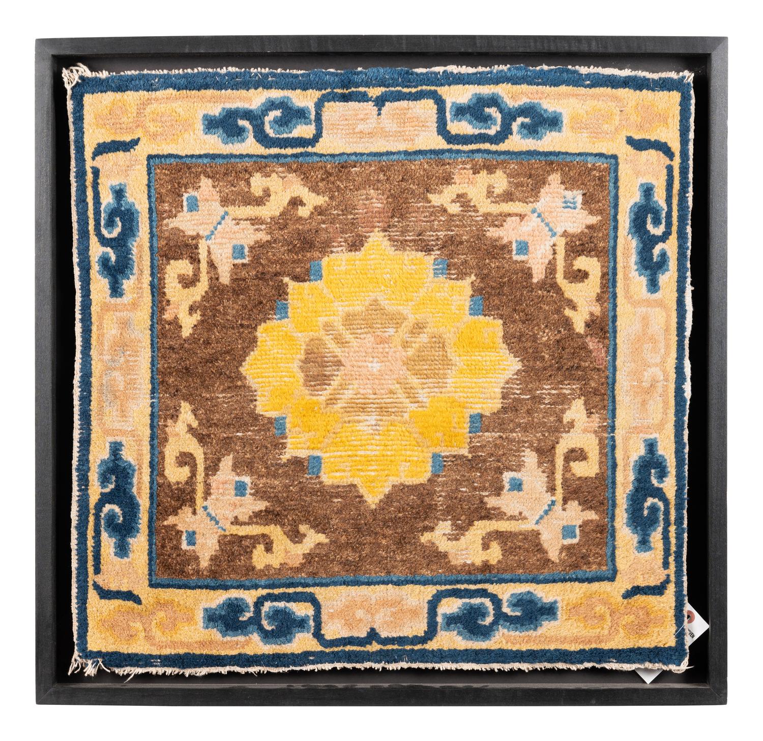 A Framed Chinese Wool Rug