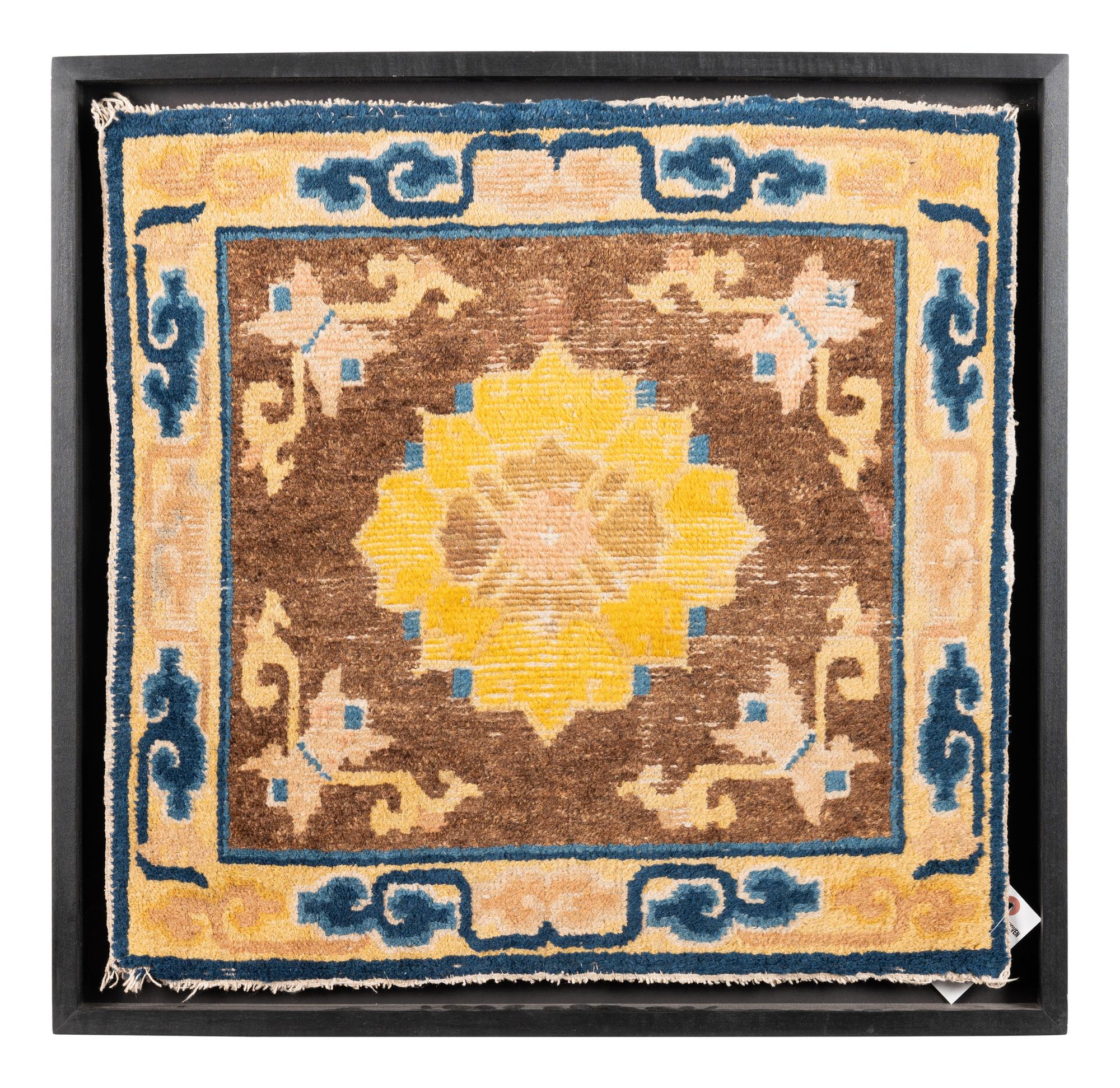 A Framed Chinese Wool Rug