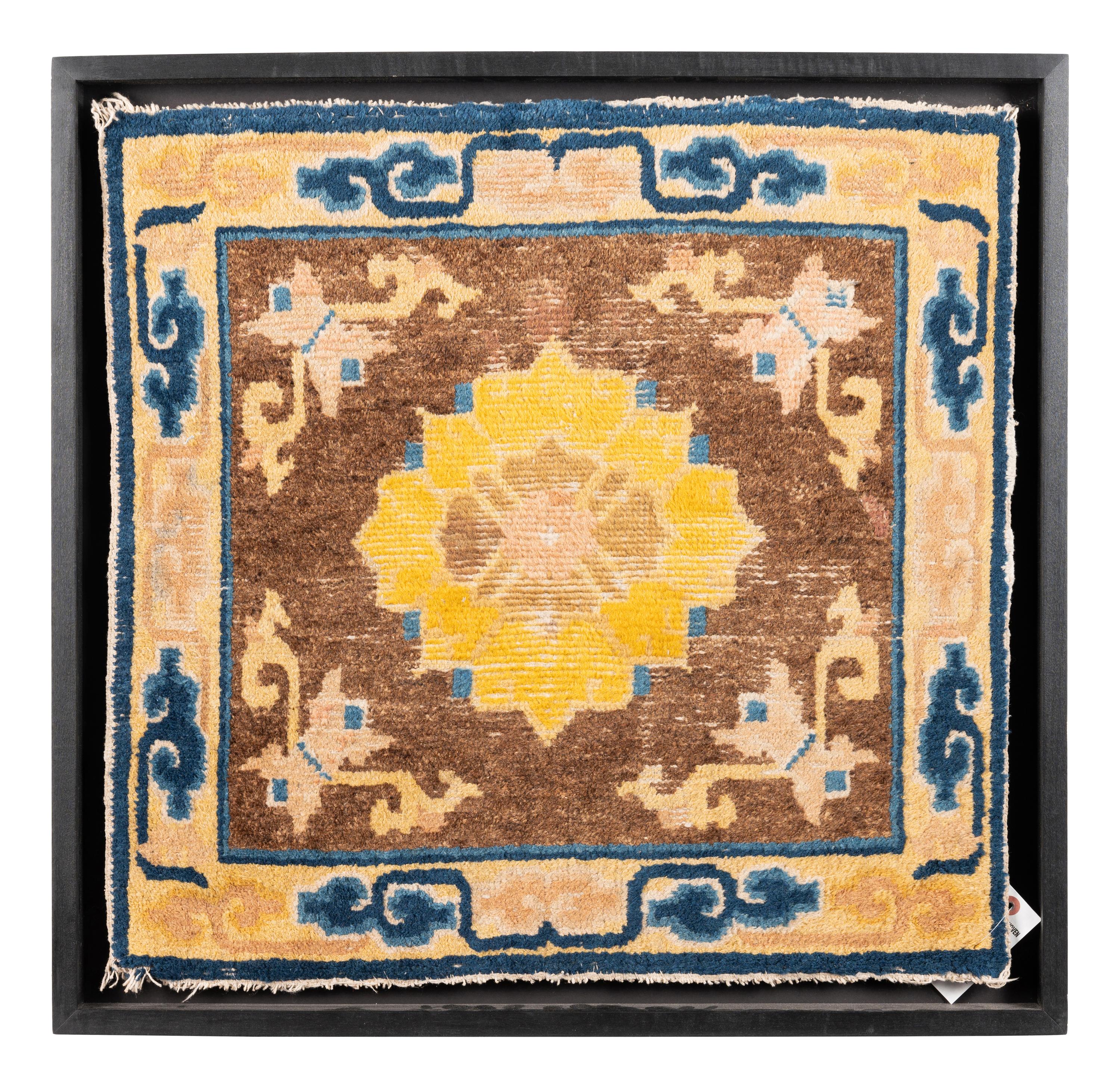 A Framed Chinese Wool Rug