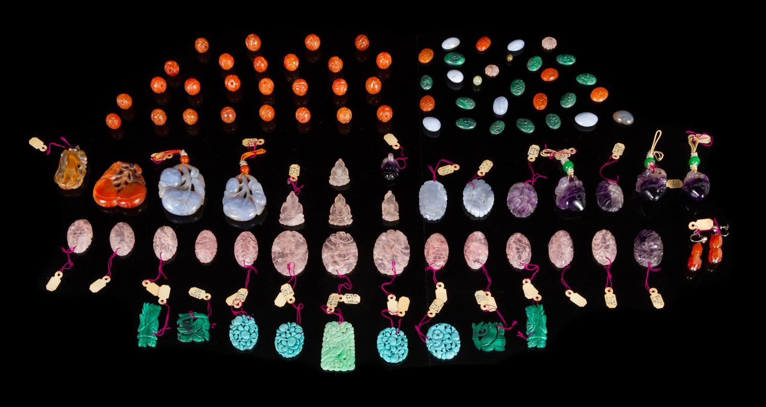 A Large Collection of Ninety-Two Hardstone Pendants and Jewelry Articles Length largest 2 1/4 inches. — 19TH-20TH CENTURY