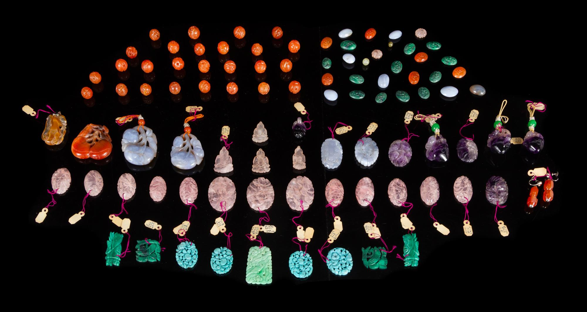 A Large Collection of Ninety-Two Hardstone Pendants and Jewelry Articles Length largest 2 1/4 inches. — 19TH-20TH CENTURY