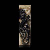 A Chinese Celadon and Black Jade 'Chilong' Sword Scabbard, Jianzhi Qing Dynasty or Earlier 清或更早 青玉提油雕螭龍劍璏
