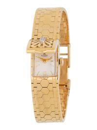 BUCHERER, 18K YELLOW GOLD AND DIAMOND SURPRISE WRISTWATCH