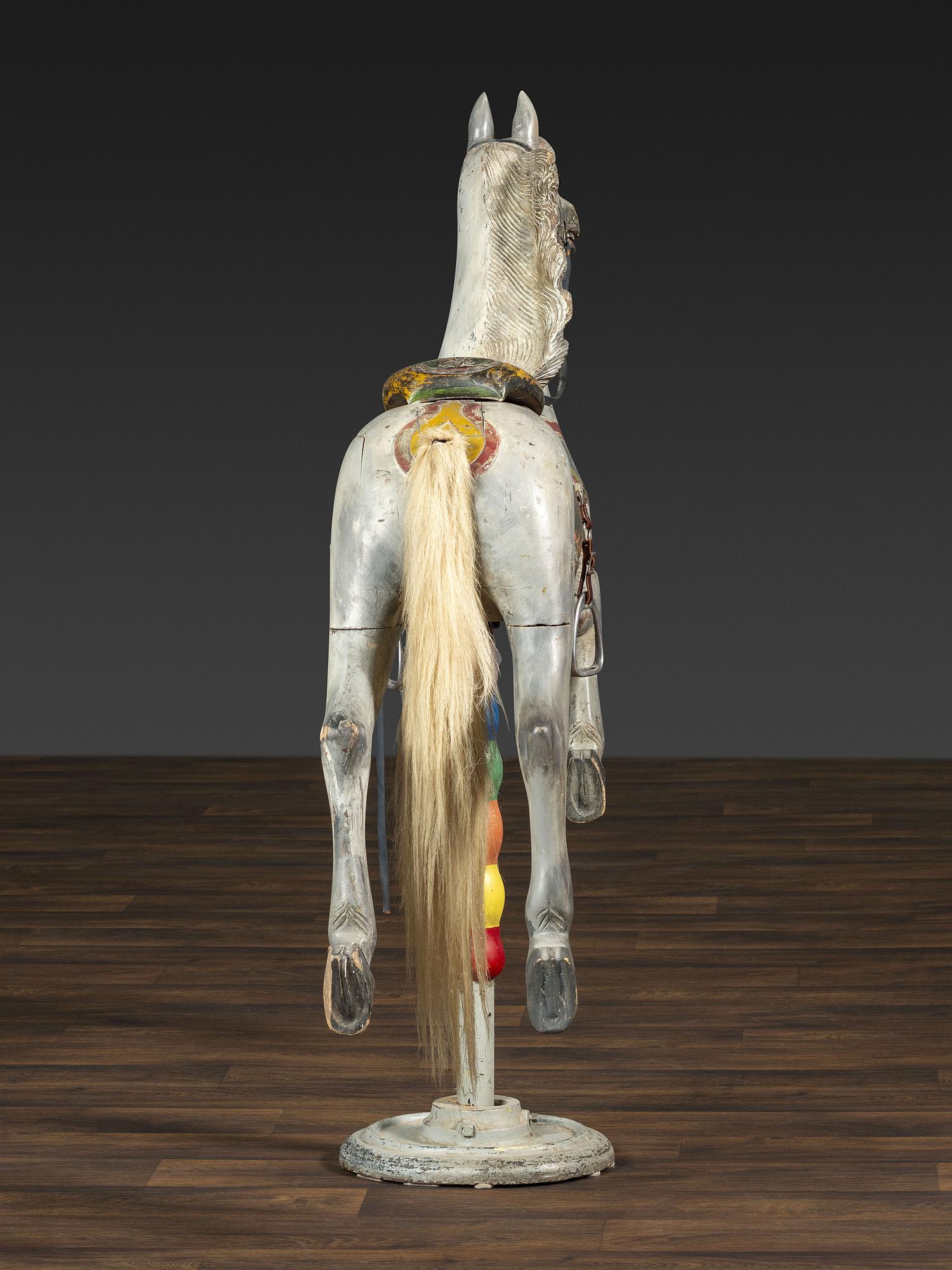 A Herschell-Spillman Carved and Painted Wood Carousel Horse