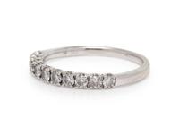 A 14 Karat White Gold and Diamond Ring,