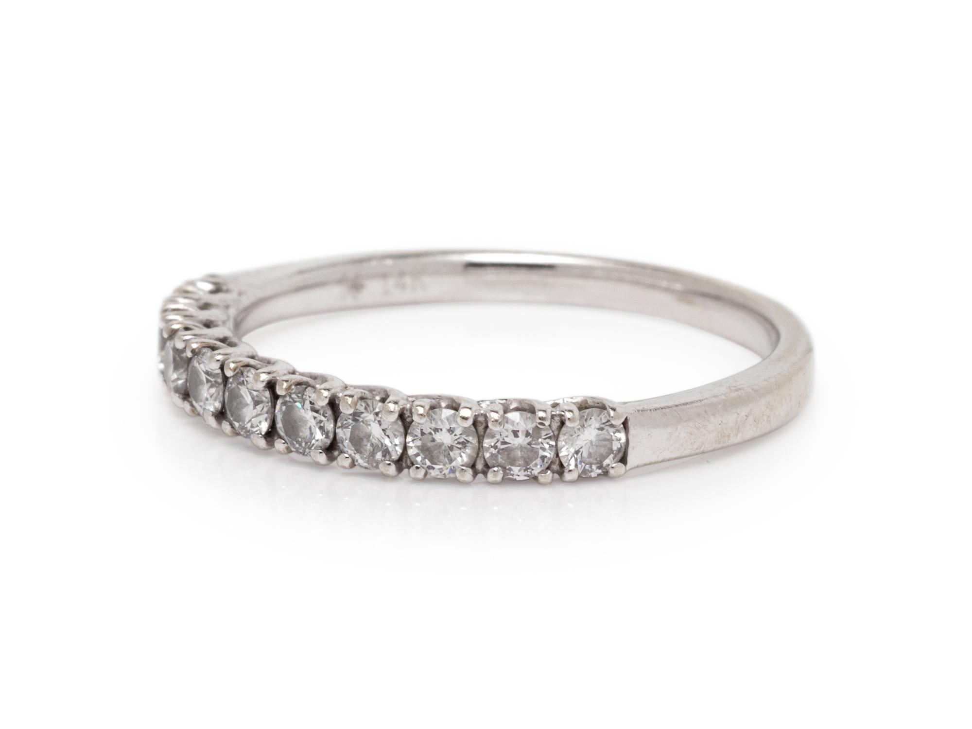 A 14 Karat White Gold and Diamond Ring,