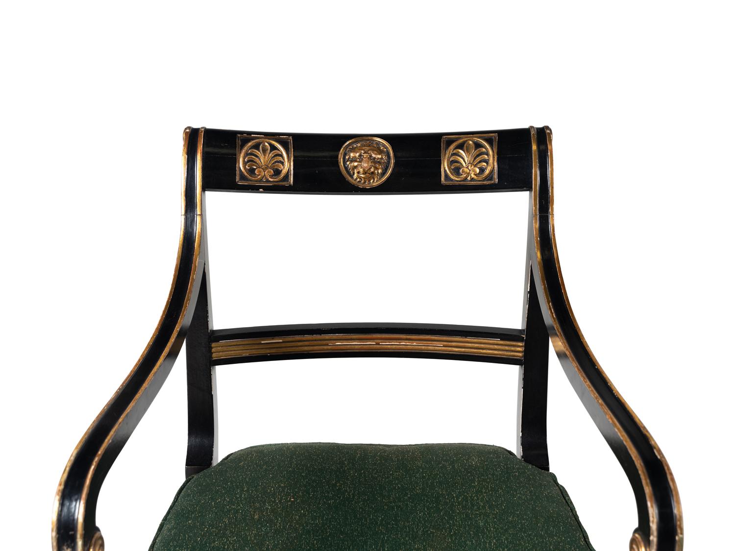 A Pair of Empire Style Ebonized and Parcel Gilt Curule Form Armchairs
