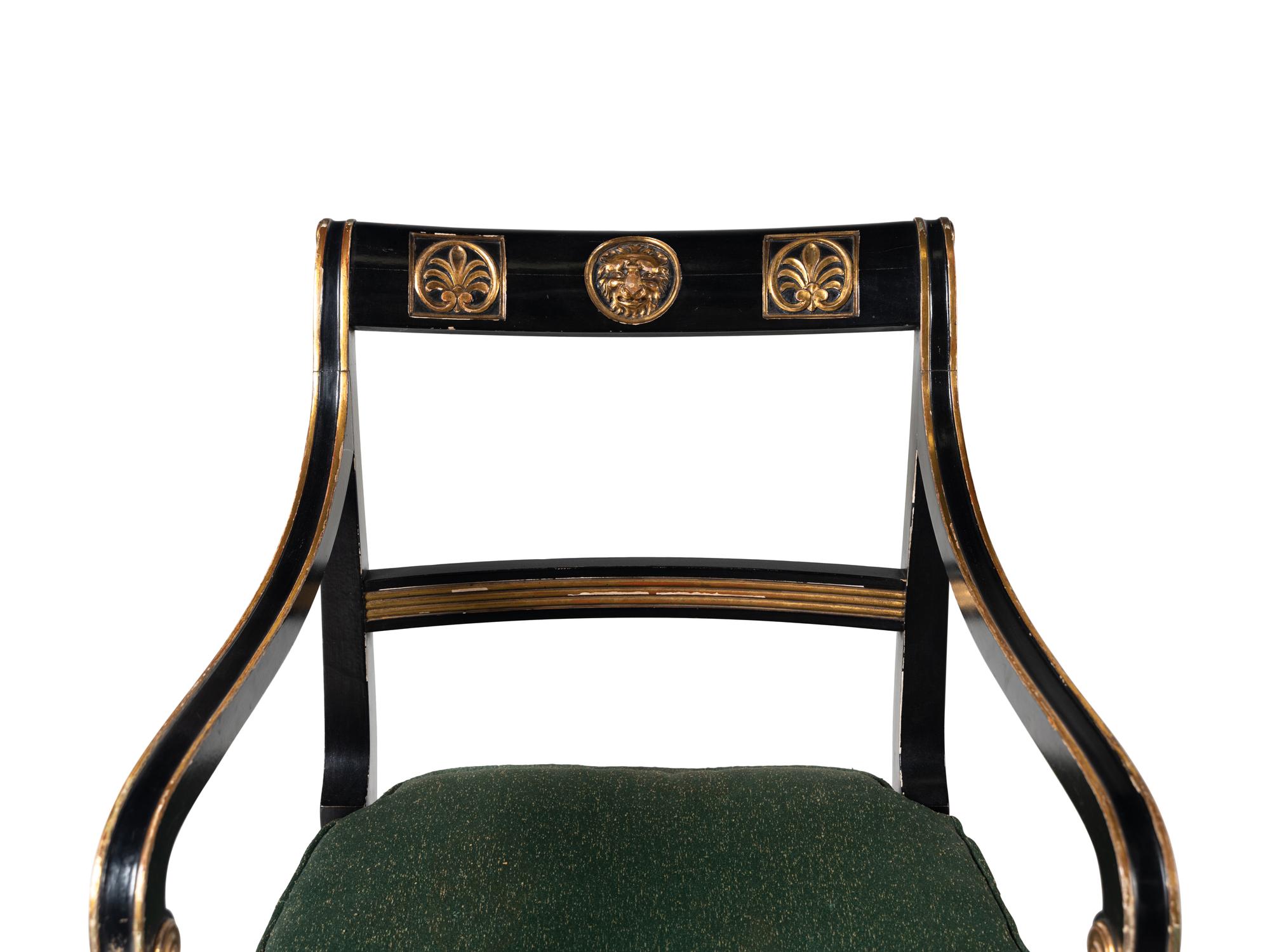 A Pair of Empire Style Ebonized and Parcel Gilt Curule Form Armchairs