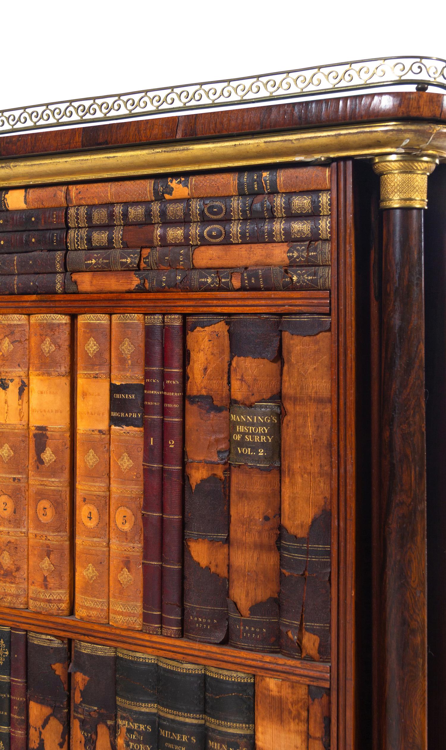 An Empire Gilt Bronze Mounted Rosewood Cabinet