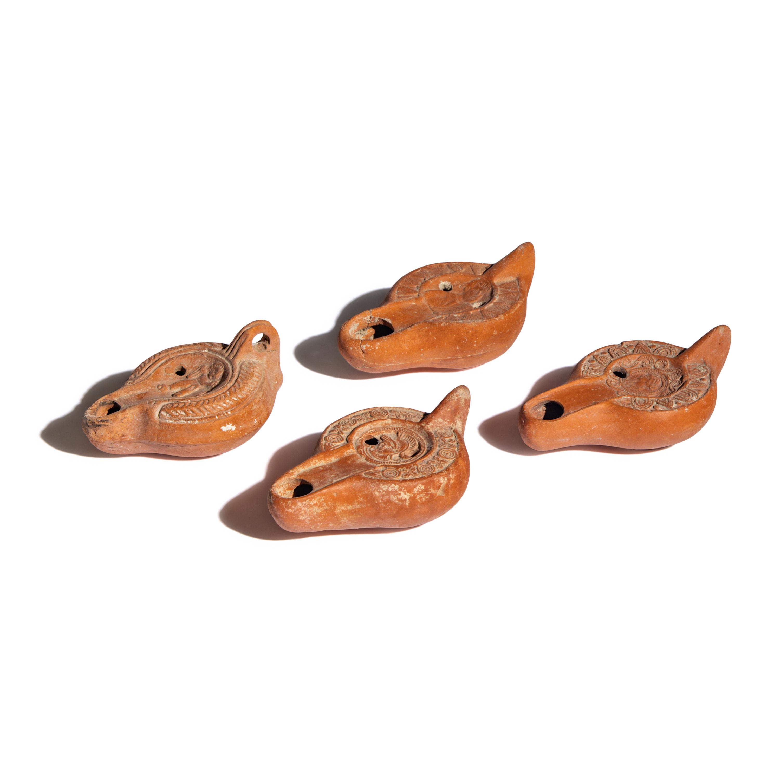 Four Roman Terracotta Lamps