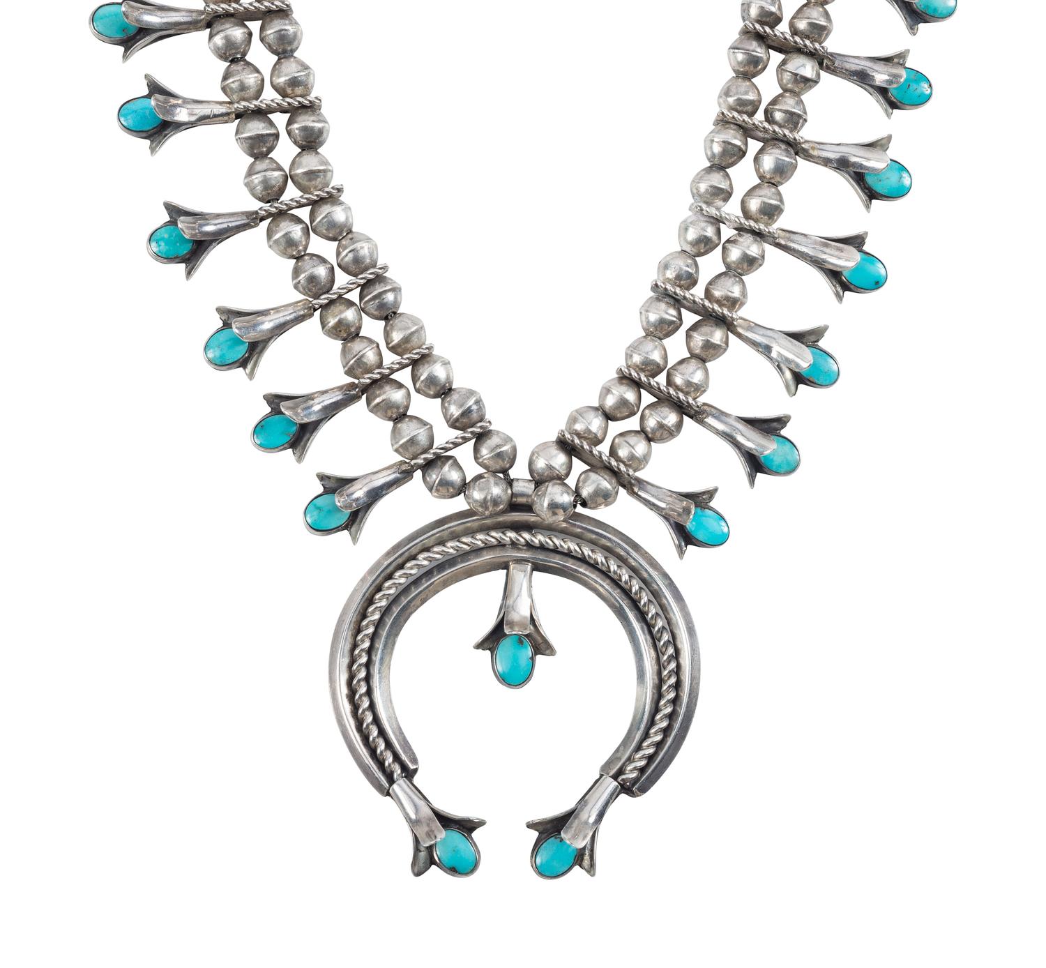 A Navajo Silver and Turquoise Squash Blossom Necklace