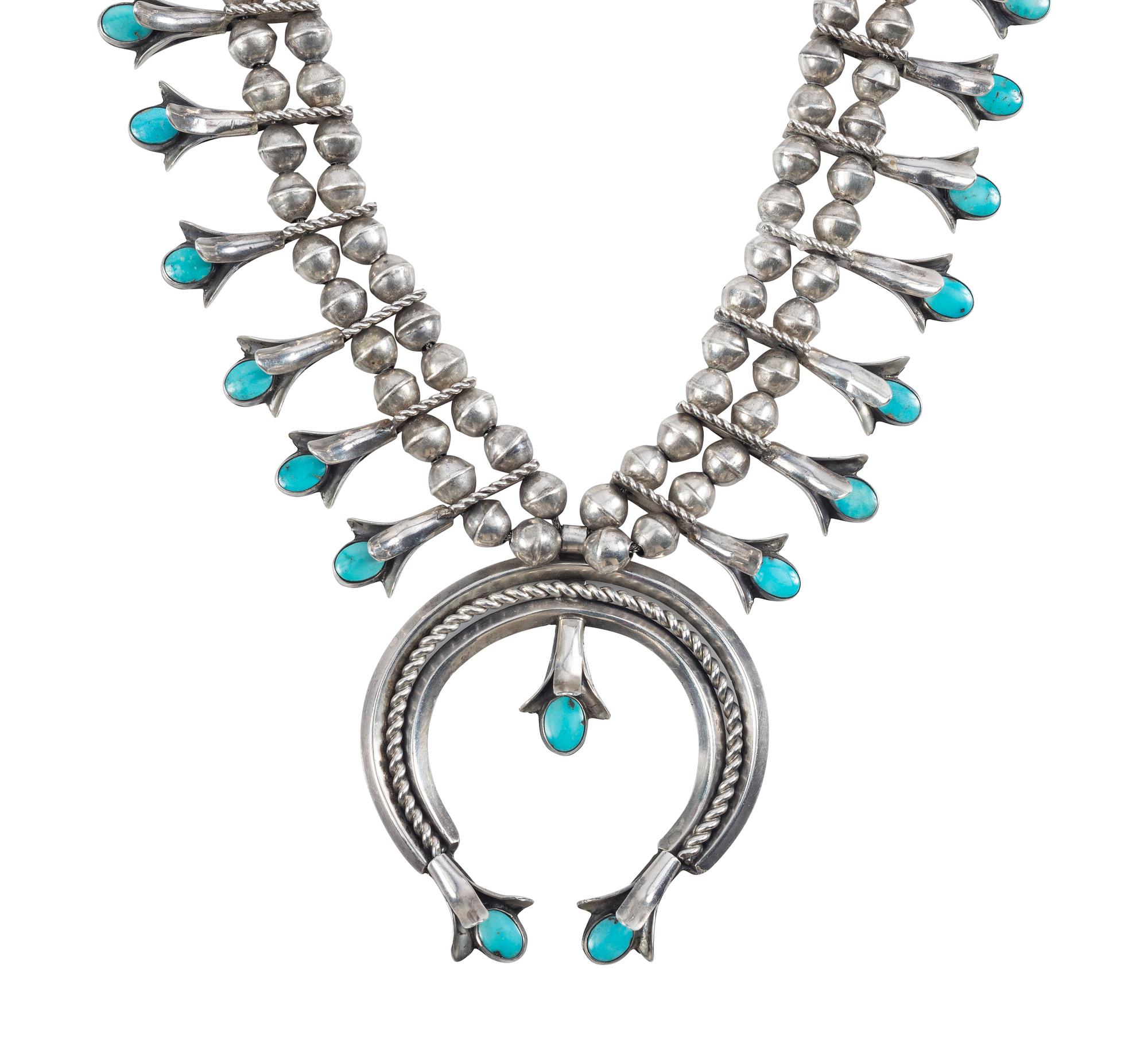 A Navajo Silver and Turquoise Squash Blossom Necklace