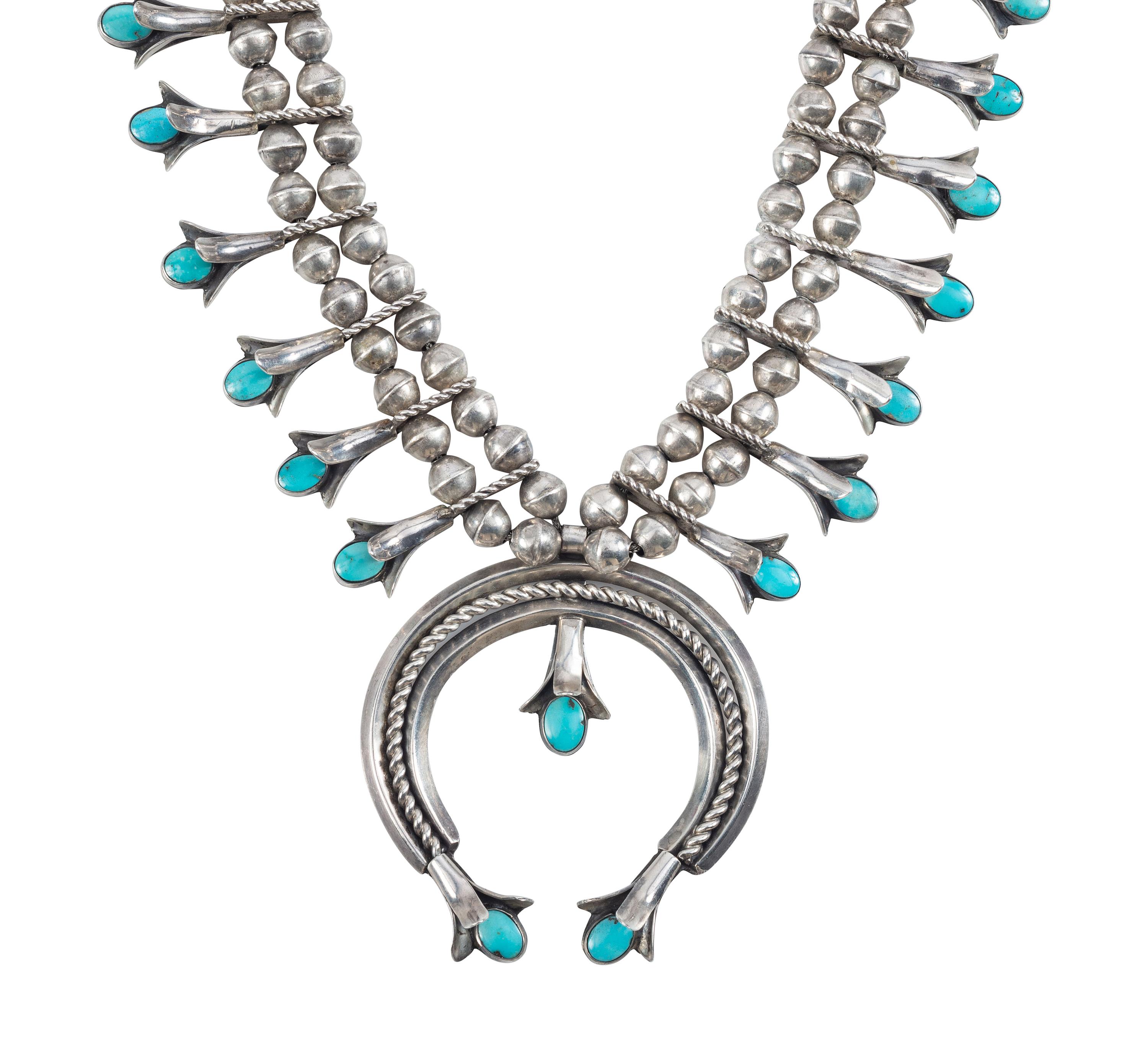 A Navajo Silver and Turquoise Squash Blossom Necklace