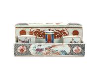 A Chinese Export Porcelain Famille Rose Inkstand And Pair Of Candlesticks
