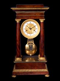 A French Gilt Bronze Mounted Mahogany Portico Clock, Ferrenbach, Chalons