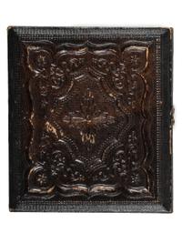 [EARLY PHOTOGRAPHY]. A group of 3 daguerreotypes featuring family groups, highlighted by a portrait of 11 family members, comprising: