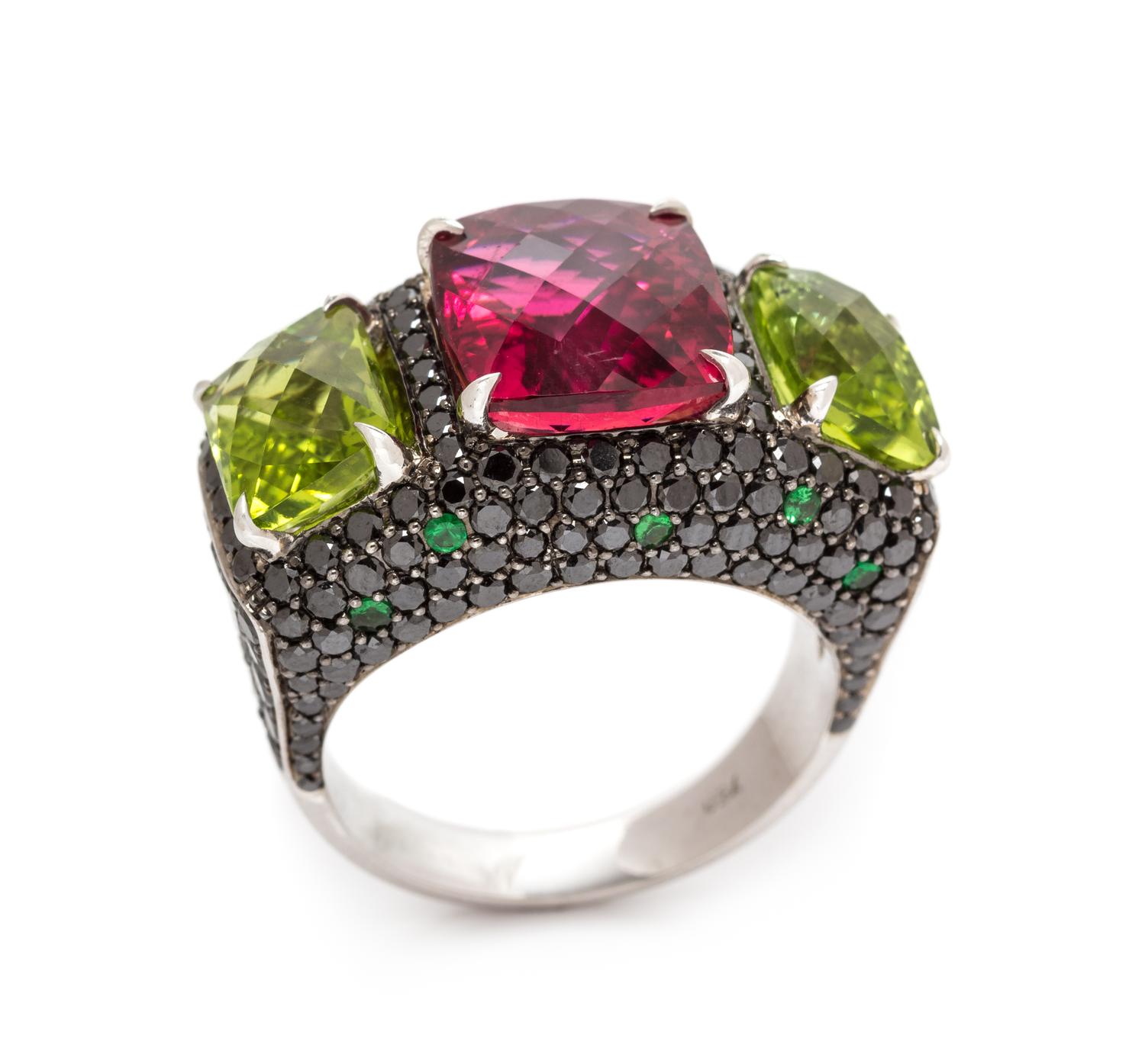 An 18 Karat White Gold, Pink Tourmaline, Peridot, Black Diamond and Tsavorite Garnet Ring, 11.25 dwts.