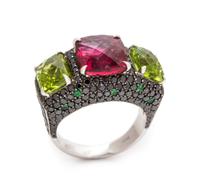 An 18 Karat White Gold, Pink Tourmaline, Peridot, Black Diamond and Tsavorite Garnet Ring, 11.25 dwts.