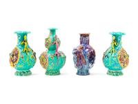 Four Chinese Carved Porcelain Vases