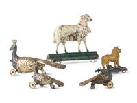 Five Pressed and Painted Tin Circus Animal Toys