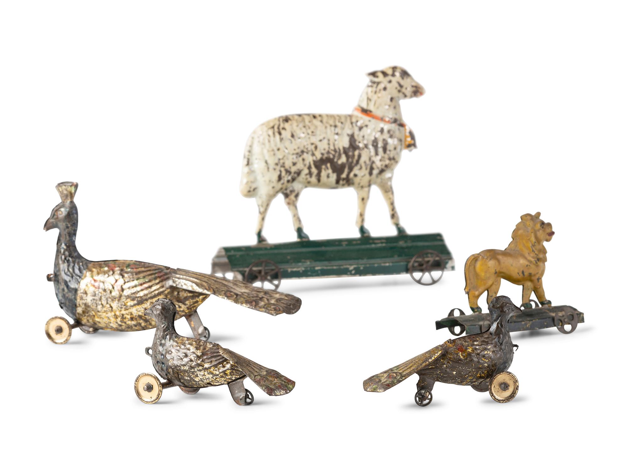 Five Pressed and Painted Tin Circus Animal Toys