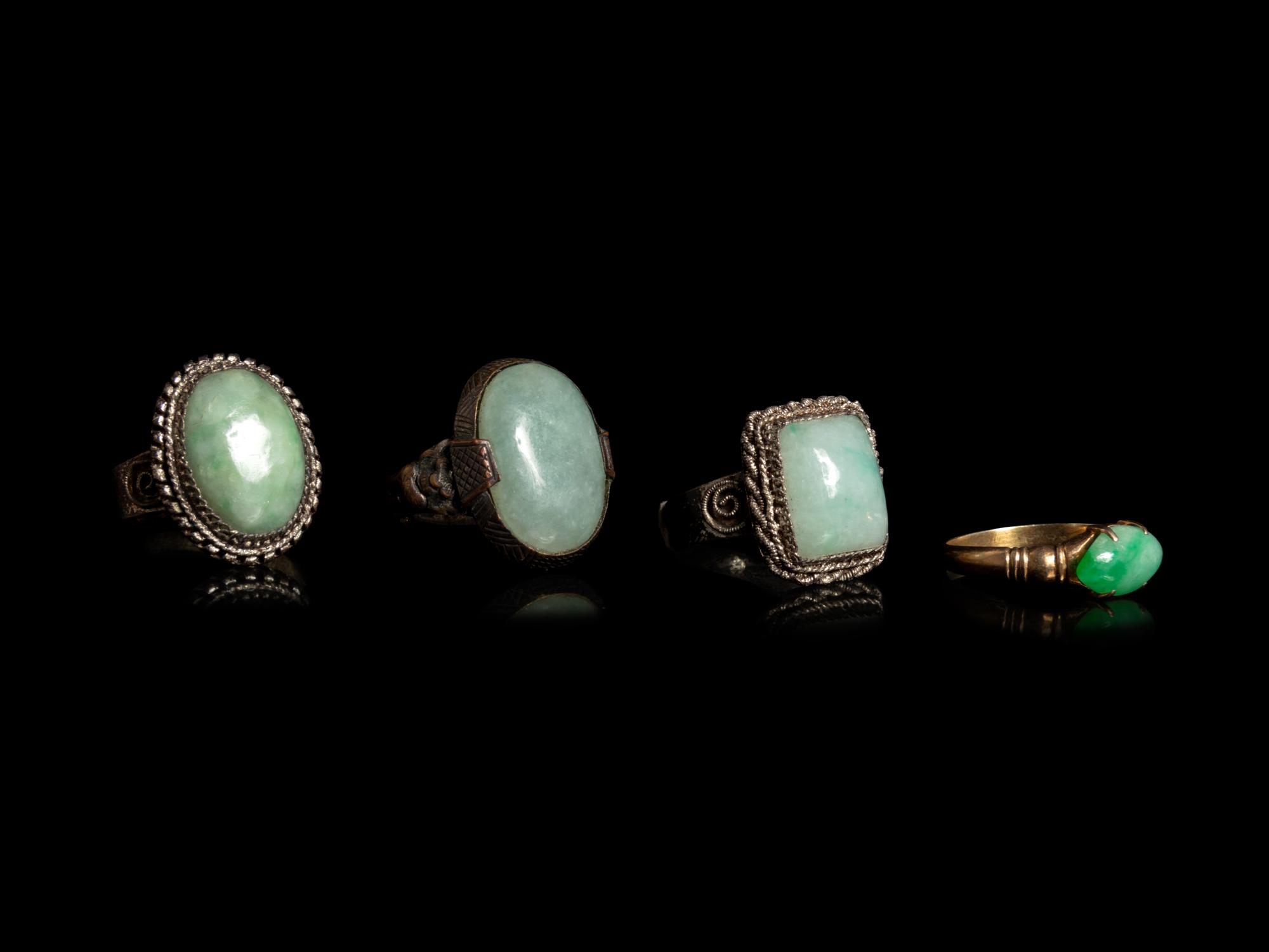 Four Chinese Jadeite Inset Metal Rings