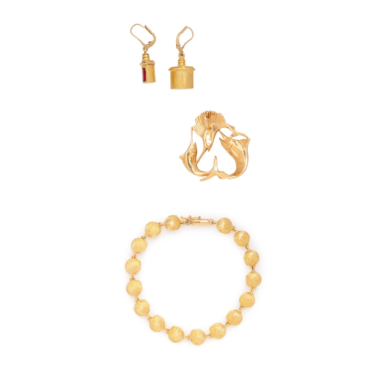 COLLECTION OF YELLOW GOLD NAUTICAL JEWELRY