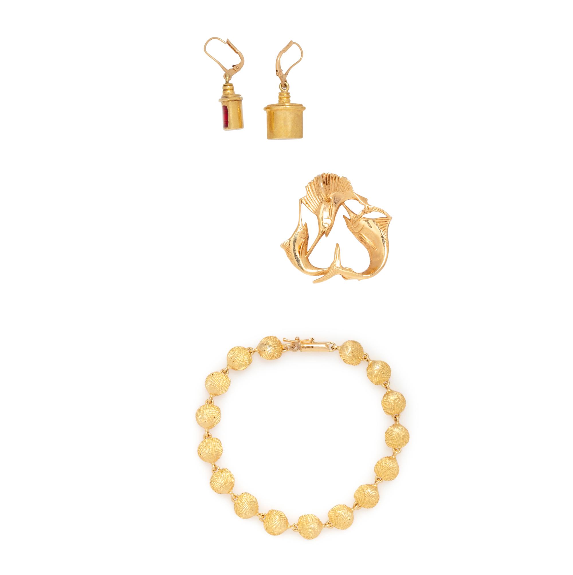 COLLECTION OF YELLOW GOLD NAUTICAL JEWELRY