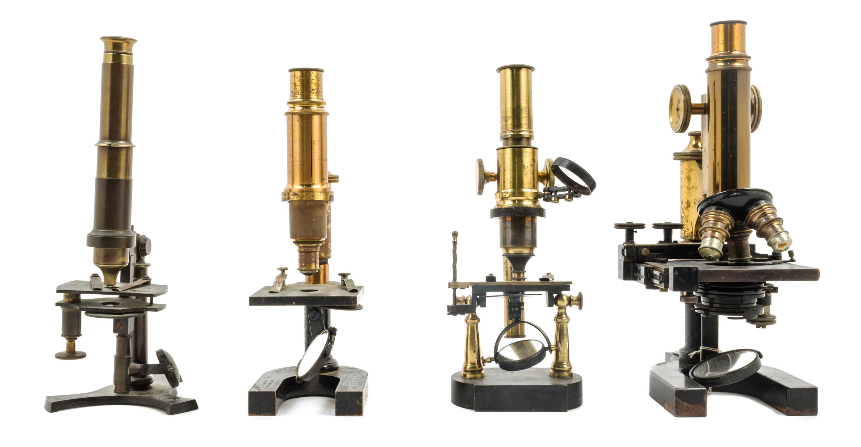 A Group of Four Brass and Black Lacquered Microscopes Height of tallest 11 3/4 inches. — LEITZ, BAUSCH & LOMB AND OTHERS