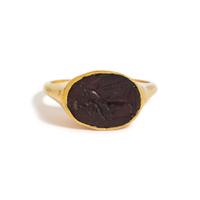 A Roman Gold and Garnet Finger Ring with the Goddess Fortuna Thyche.