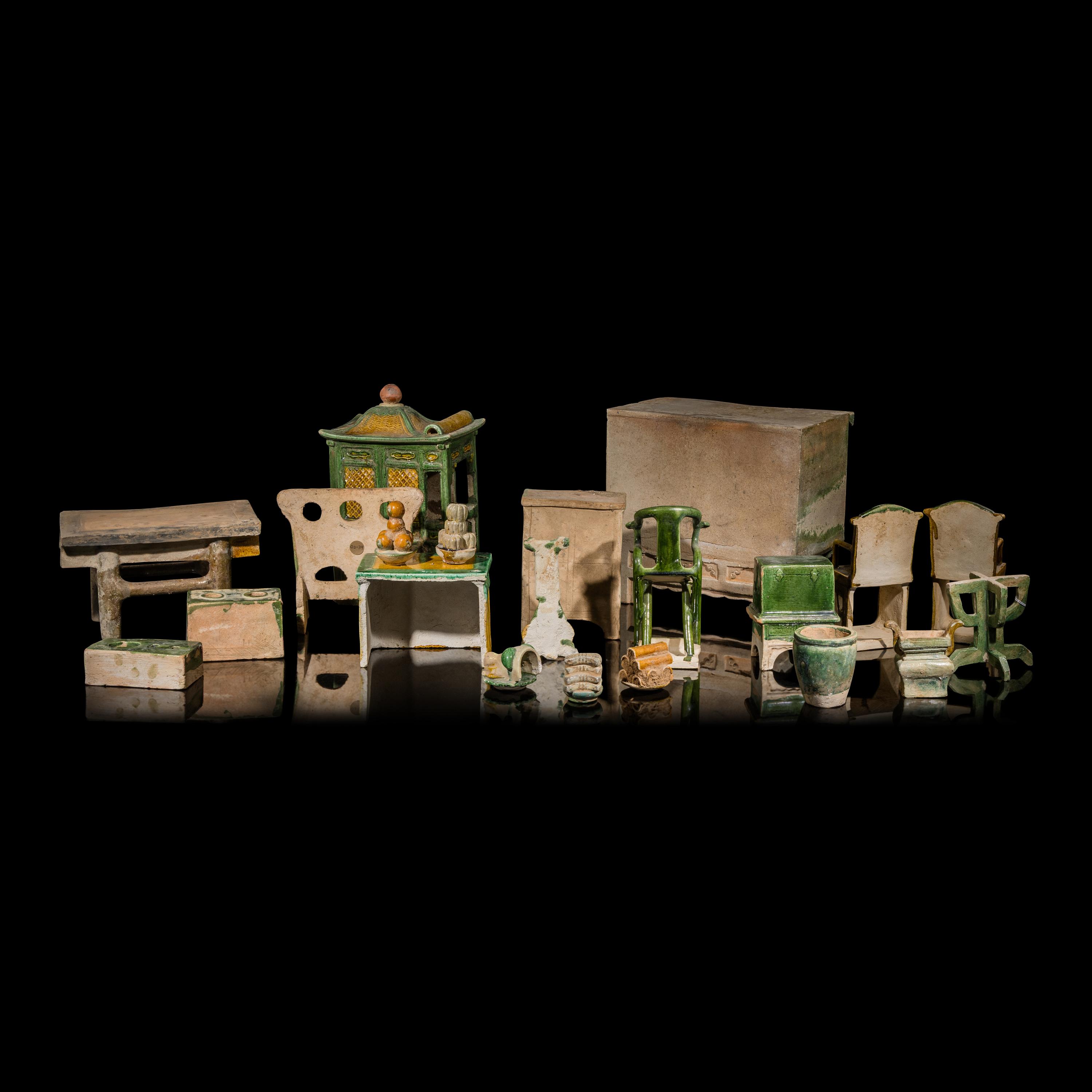 A Collection of Chinese Sancai Glazed Pottery Models of Furniture, Ming Dynasty — 明 三彩交椅、供桌、床等一組二十一件