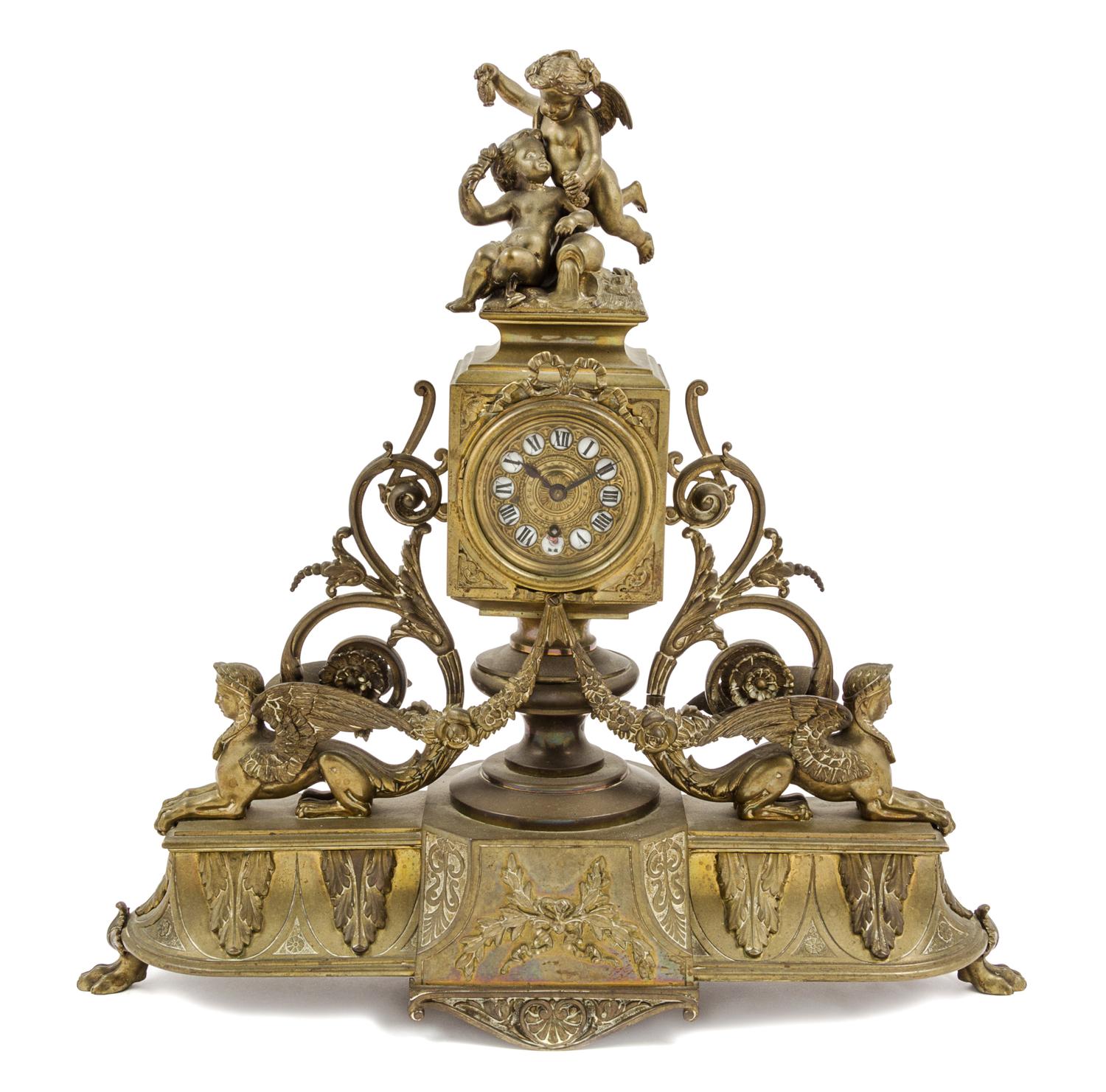 An Aesthetic Movement Gilt Metal Mantel Clock Height 16 inches. — LATE 19TH CENTURY