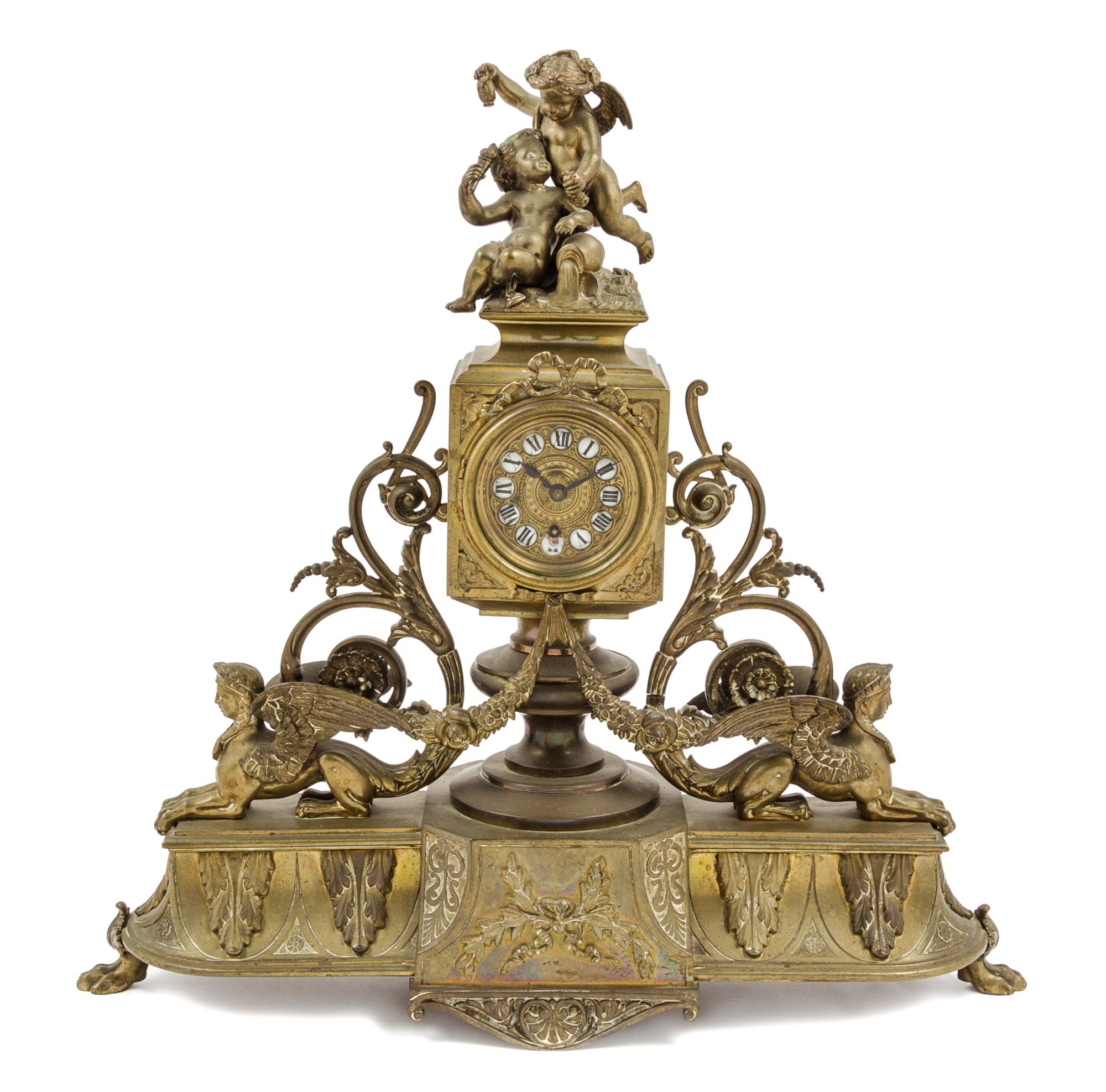 An Aesthetic Movement Gilt Metal Mantel Clock Height 16 inches. — LATE 19TH CENTURY