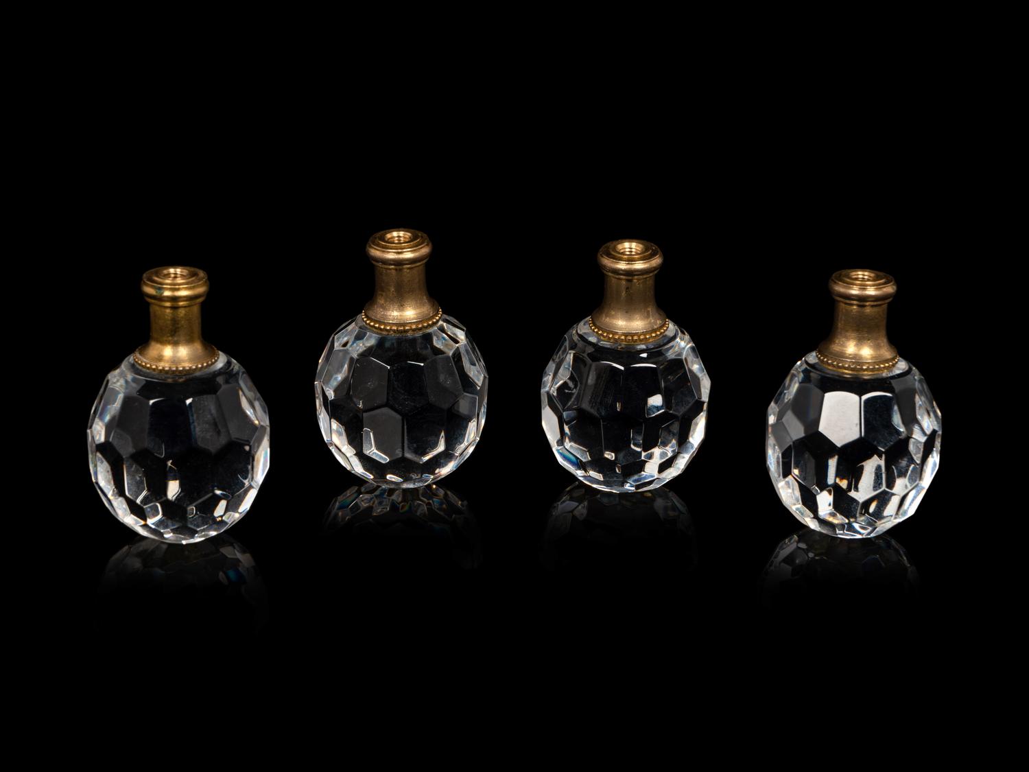 A Set of Four Waterford Cut Glass Lamp Finials