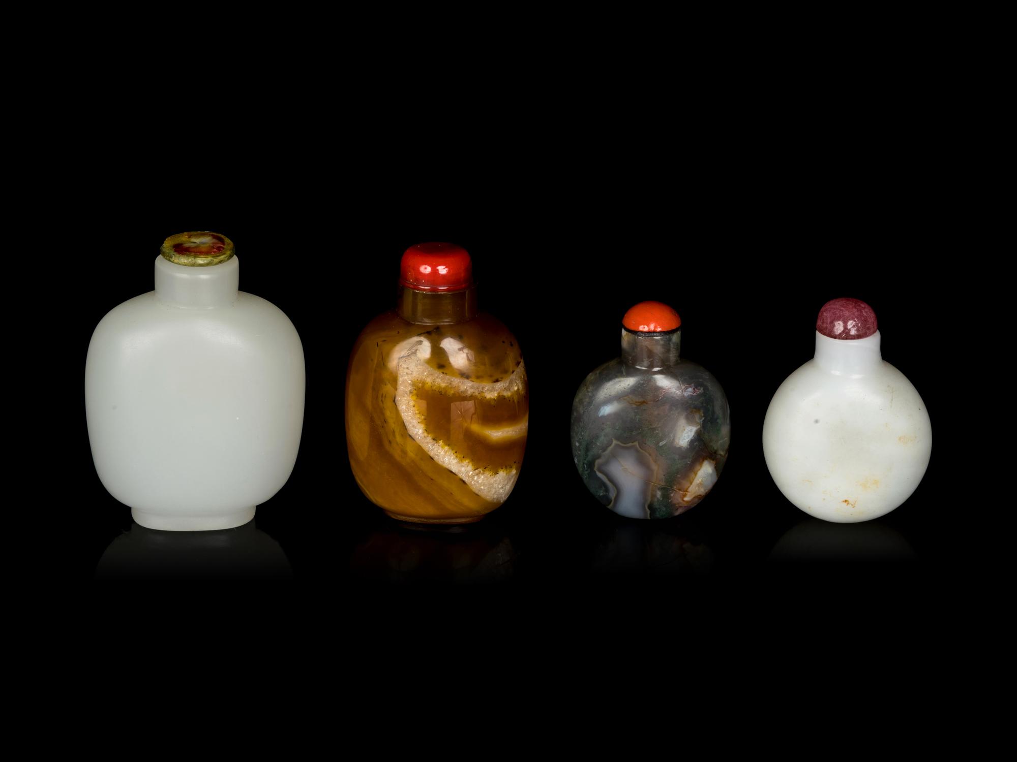 Four Chinese Hardstone and Peking Glass Snuff Bottles