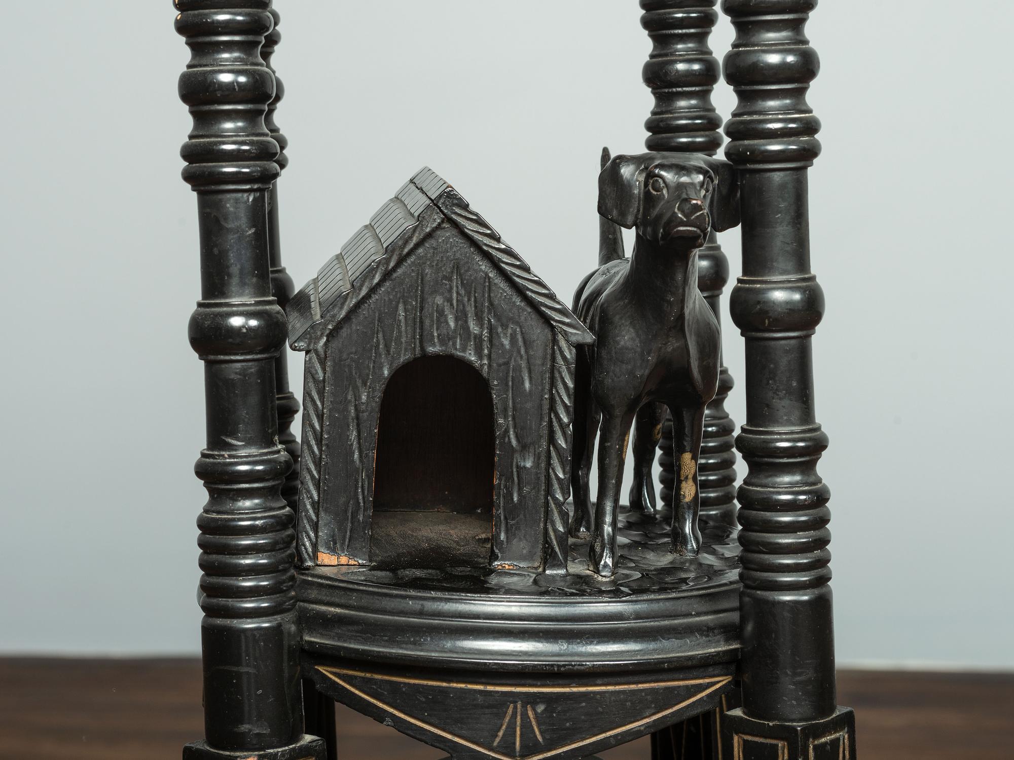A Victorian Marble-Top Carved and Ebonized Parlor Table with Dog