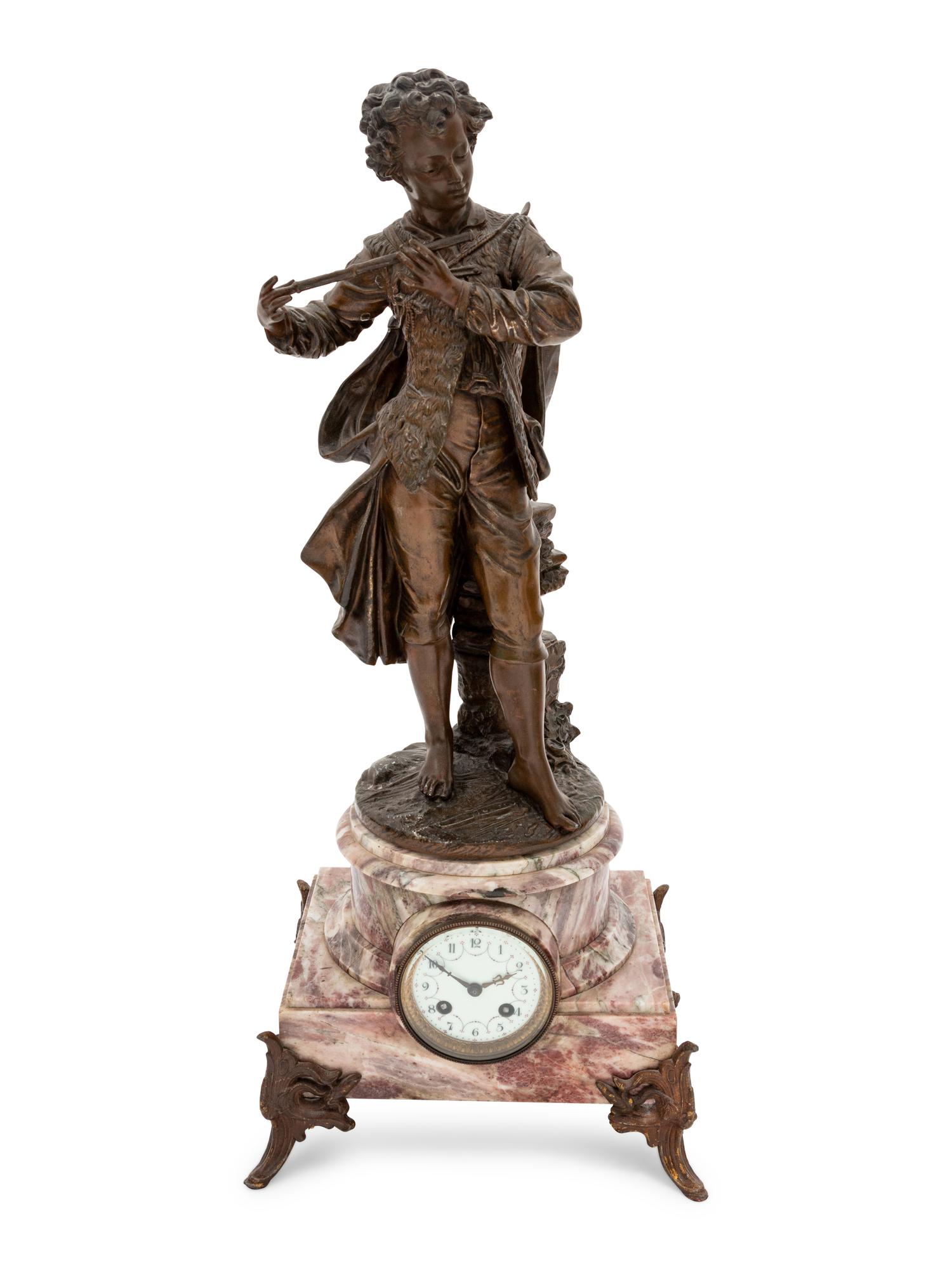 A Continental Bronze and Marble Figural Clock