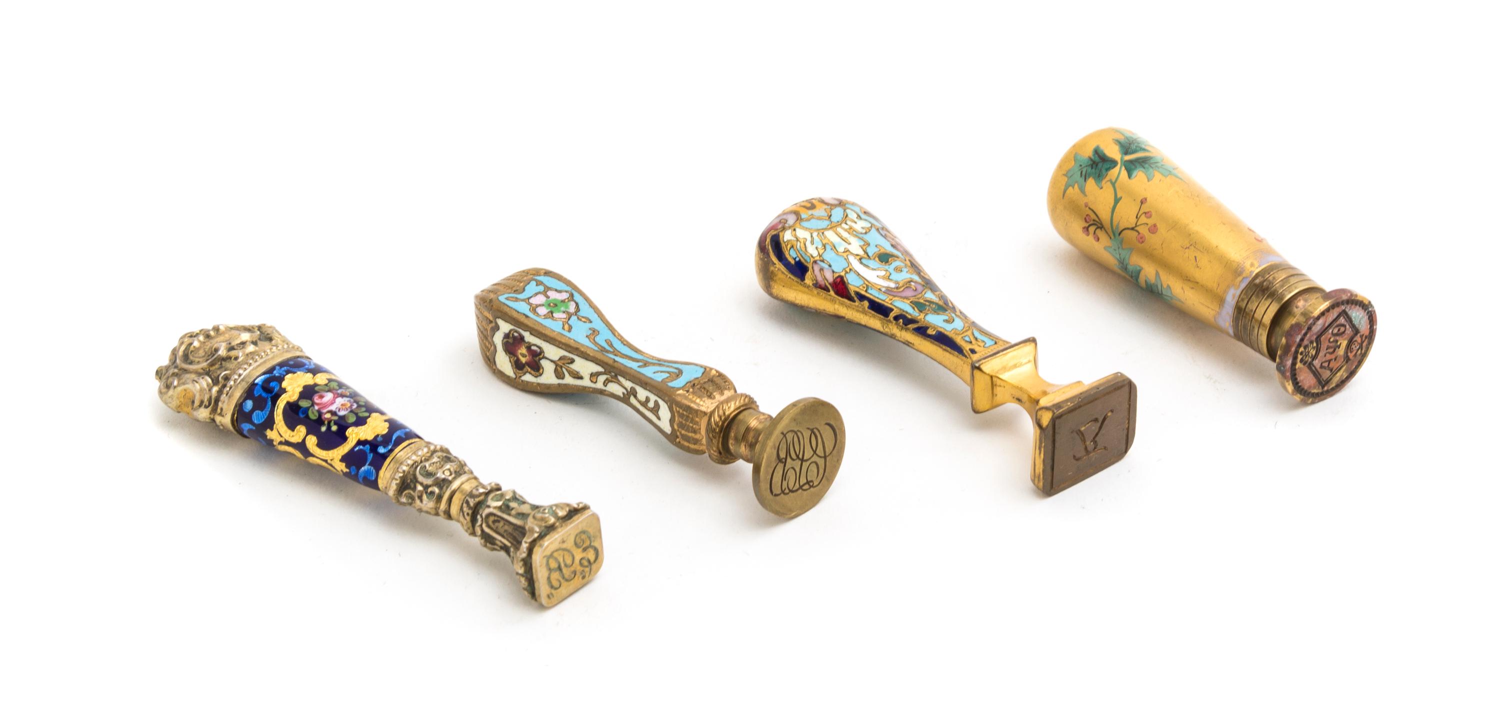A Collection of Four Continental Seals, Height of tallest 3 1/8 inches.