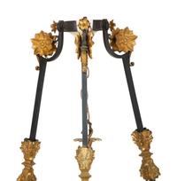 A French Empire Style Ebonized and Gilt Metal Fourteen-Light Chandelier