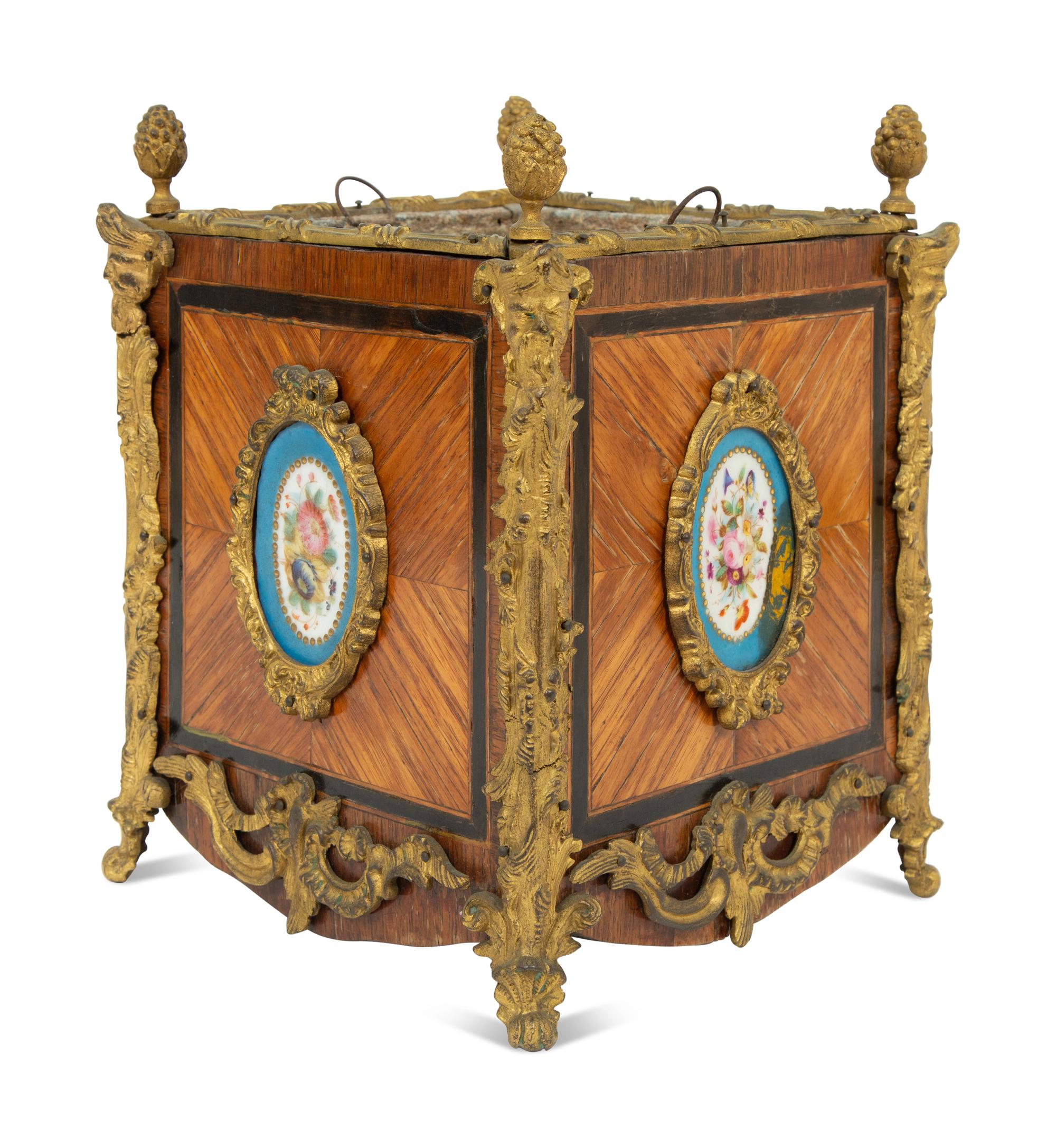 A French Gilt Bronze and Sevres Style Porcelain Mounted Kingwood Jardinière