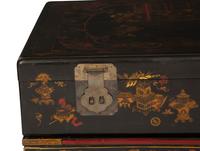 A Chinese Lacquered Trunk on Stand